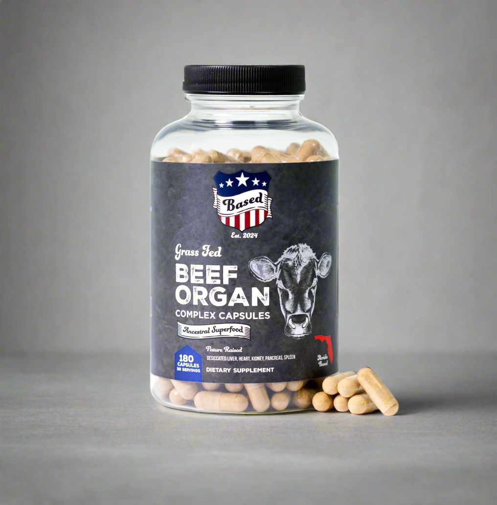 A bottle of Based's Beef Organ Multivitamin with pills next to bottle