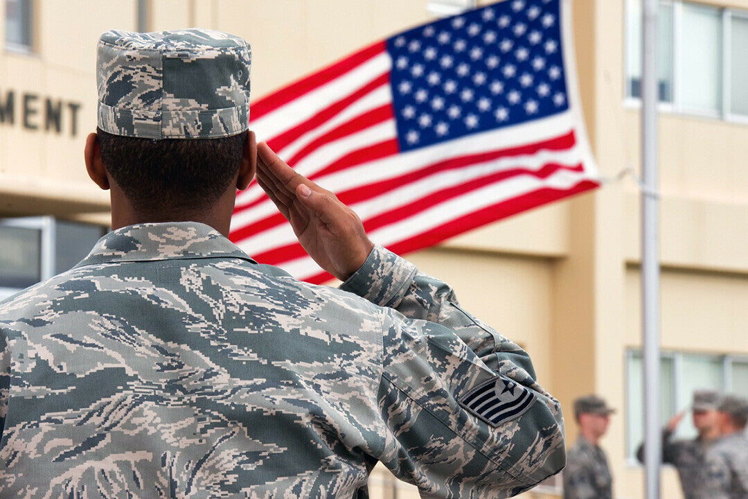 Air Force Member Saluting the American flag